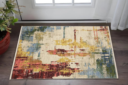 2' X 3' Beige Orange And Red Abstract Area Rug With Fringe