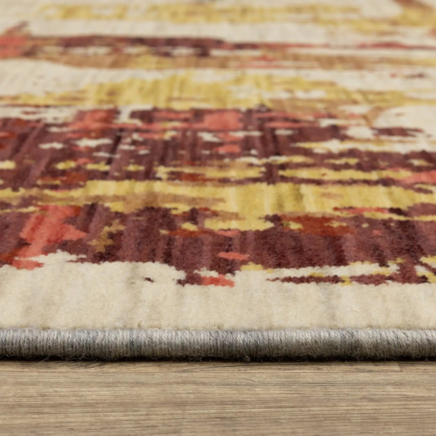 2' X 3' Beige Orange And Red Abstract Area Rug With Fringe