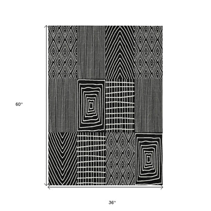 3' X 5' Black And Ivory Geometric Washable Indoor Outdoor Area Rug