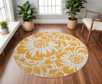 8' Orange And Ivory Floral Washable Round Rug With UV Protection
